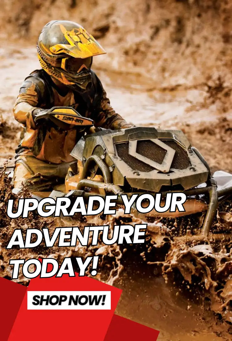 Yellow and black motocross helmet with a visor, worn by an rider in muddy terrain.